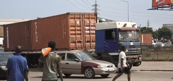 Danger looms on the roads - Unlatched Cargo Trucks.