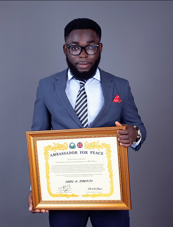 Ghanaian  journalist  cum comic  actor, Isaac Kofi Dzokpo a.k.a  Hon Ike has been awarded as peace ambassador by the Universal Peace