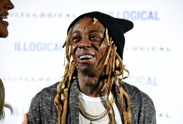 Hip pop star Lil Wayne banned from entering UK