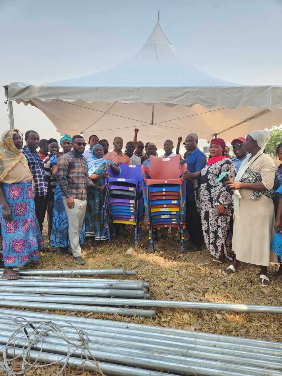Bole-Baboi: MP supports MO Community with giant canopies and metallic plastic chairs